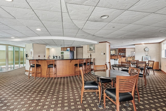 78 10th St E Unit 2901, Saint Paul, MN 55101 - carpeted dining area with a bar