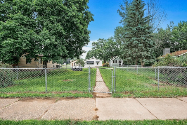 4242 Zane Ave N, Crystal, MN 55422 - view of front of house with a garage and a gate