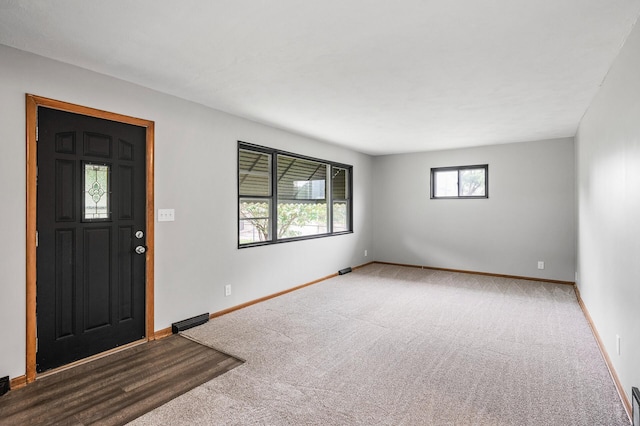 4242 Zane Ave N, Crystal, MN 55422 - entrance foyer featuring carpet flooring and baseboards