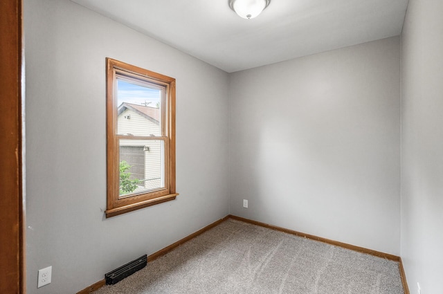 4242 Zane Ave N, Crystal, MN 55422 - carpeted empty room featuring plenty of natural light