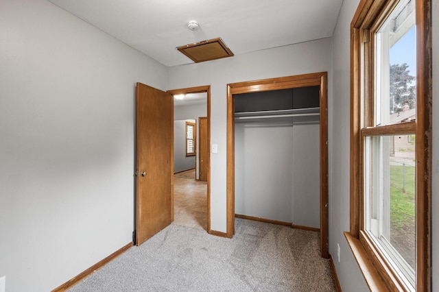 4242 Zane Ave N, Crystal, MN 55422 - unfurnished bedroom with multiple windows, carpet floors, and a closet