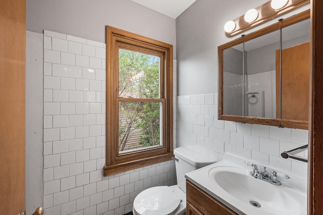 4242 Zane Ave N, Crystal, MN 55422 - bathroom featuring tile walls, vanity, a shower, and decorative backsplash