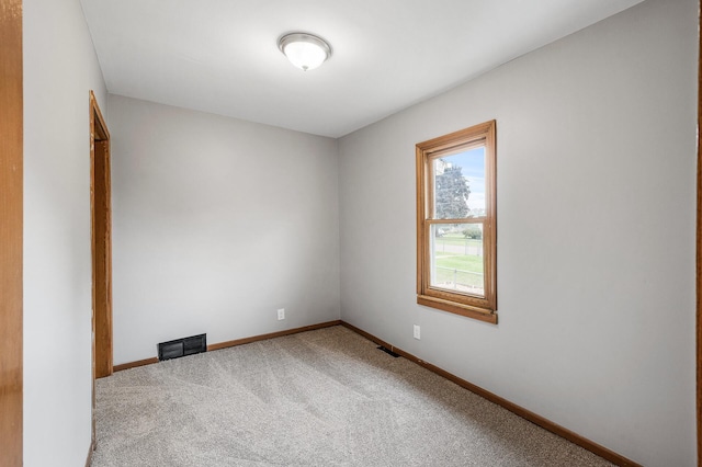 4242 Zane Ave N, Crystal, MN 55422 - carpeted empty room featuring baseboards