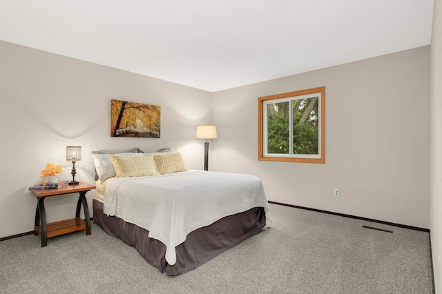 8824 134th St W, Apple Valley, MN 55124 - carpeted bedroom featuring baseboards