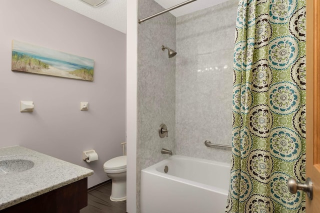 8824 134th St W, Apple Valley, MN 55124 - full bath featuring shower / tub combo with curtain, vanity, and wood finished floors