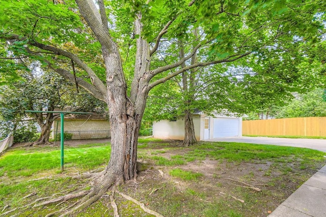 53 Morningside Dr, Saint Paul, MN 55119 - view of yard with driveway and an outbuilding