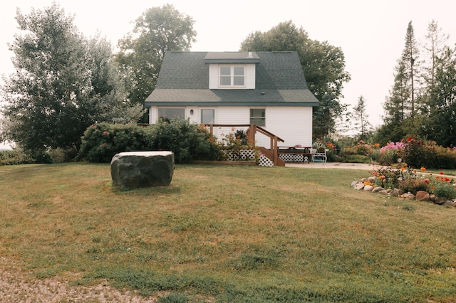 2834 150th St, Luck, WI 54837 - back of property with a yard and a wooden deck