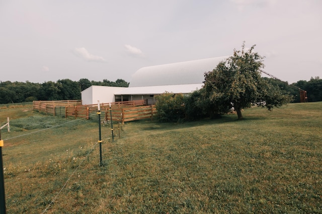 2834 150th St, Luck, WI 54837 - view of yard featuring a pole building, an outbuilding, a view of countryside, and an exterior structure
