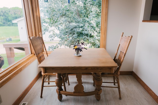 2834 150th St, Luck, WI 54837 - dining space featuring baseboards and wood finished floors