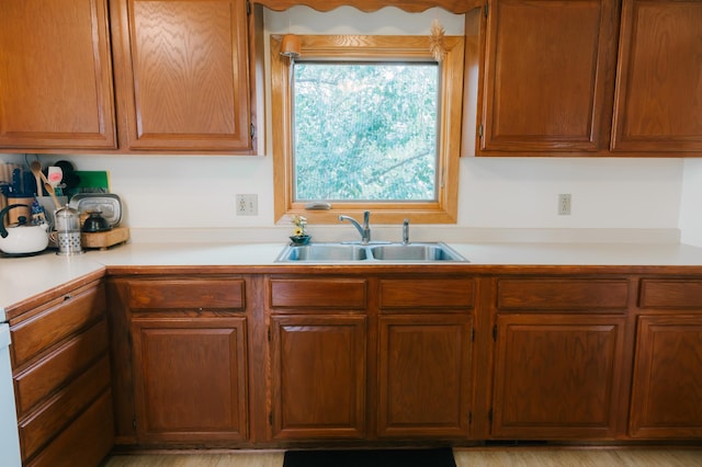 2834 150th St, Luck, WI 54837 - kitchen featuring light countertops and brown cabinets