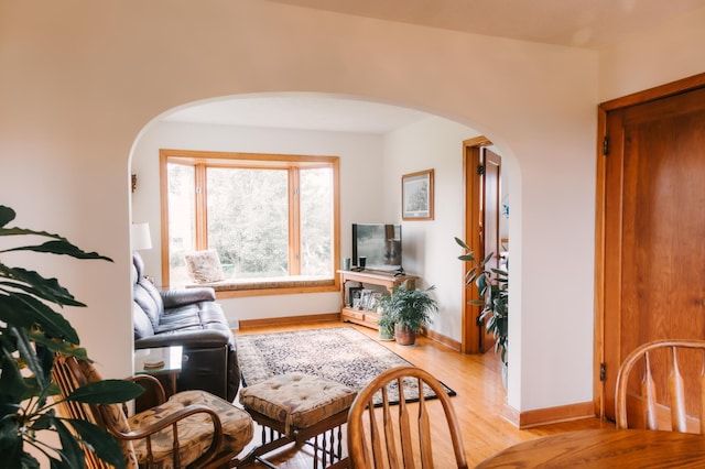 2834 150th St, Luck, WI 54837 - living room with arched walkways and light wood finished floors