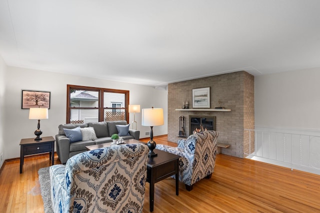 715 Forest Dale Rd, New Brighton, MN 55112 - living area with wood finished floors and a fireplace