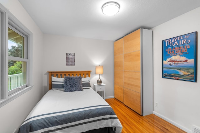 715 Forest Dale Rd, New Brighton, MN 55112 - bedroom with light wood-style floors