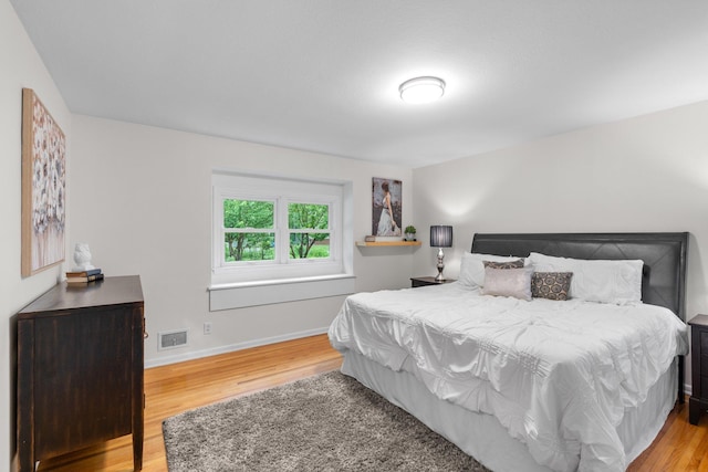 715 Forest Dale Rd, New Brighton, MN 55112 - bedroom with wood finished floors and baseboards