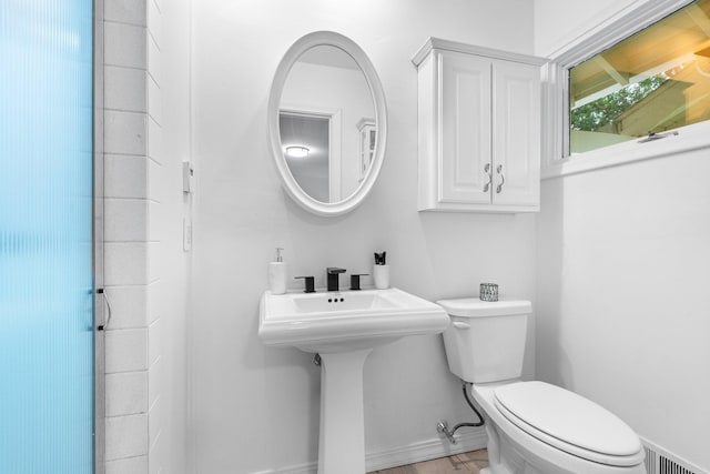 715 Forest Dale Rd, New Brighton, MN 55112 - half bath featuring toilet and baseboards