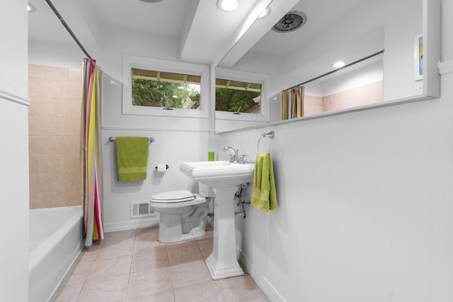 715 Forest Dale Rd, New Brighton, MN 55112 - full bathroom with shower / bath combination with curtain and tile patterned flooring