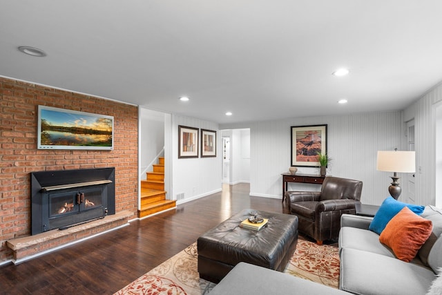 715 Forest Dale Rd, New Brighton, MN 55112 - living room featuring wood finished floors, stairs, a brick fireplace, and recessed lighting