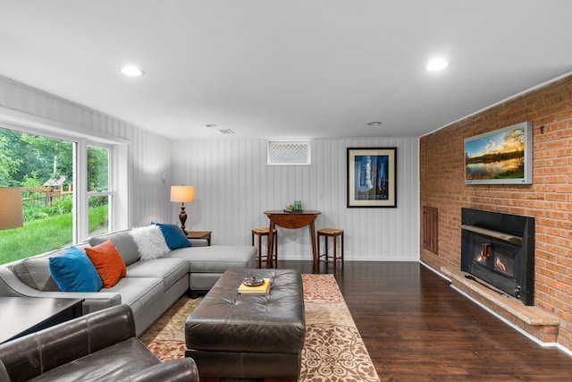 715 Forest Dale Rd, New Brighton, MN 55112 - living area featuring wood finished floors, a fireplace, and recessed lighting
