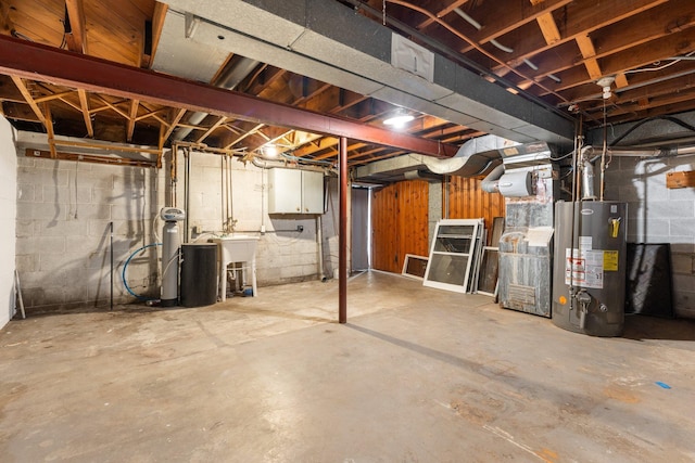 715 Forest Dale Rd, New Brighton, MN 55112 - unfinished below grade area with water heater and a sink