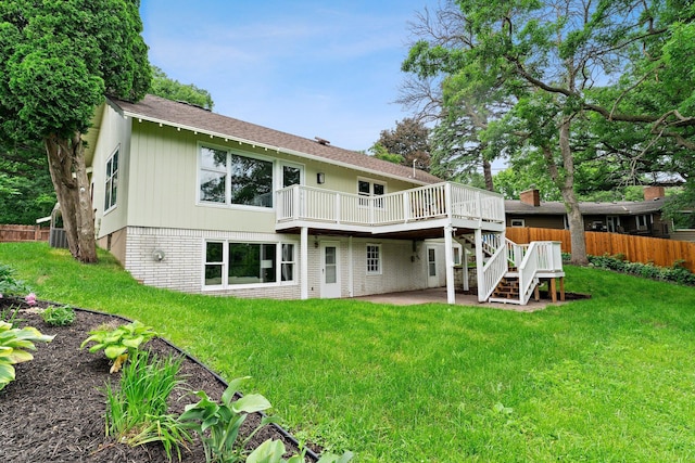 715 Forest Dale Rd, New Brighton, MN 55112 - rear view of house with a deck, a patio area, stairs, and roof with shingles