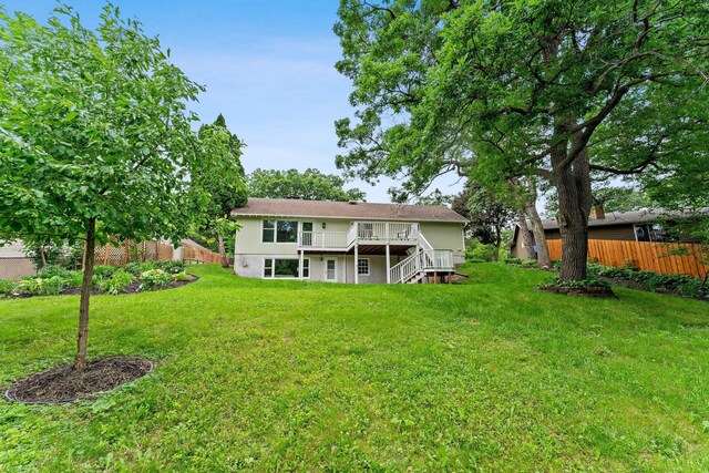 715 Forest Dale Rd, New Brighton, MN 55112 - rear view of house with a deck and stairs