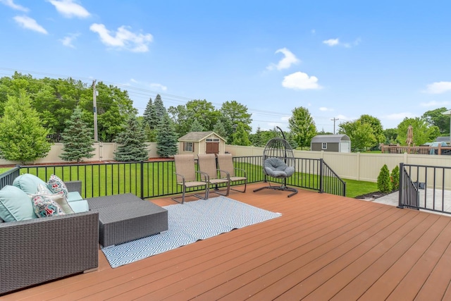369 144th Ln NW, Andover, MN 55304 - wooden deck featuring a shed, a fenced backyard, and an outdoor hangout area