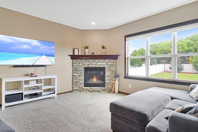 369 144th Ln NW, Andover, MN 55304 - living area featuring carpet flooring, a stone fireplace, and recessed lighting