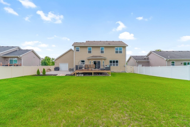 369 144th Ln NW, Andover, MN 55304 - back of house with a deck and a fenced backyard