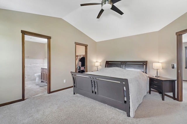 369 144th Ln NW, Andover, MN 55304 - bedroom featuring lofted ceiling, carpet, a walk in closet, connected bathroom, and a closet