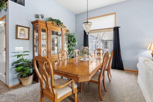 1978 110th Ct NE Unit 1103, Blaine, MN 55449 - dining space with light carpet and a chandelier