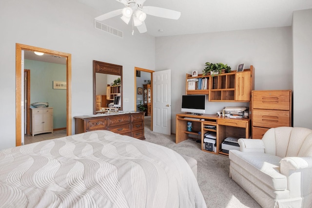 1978 110th Ct NE Unit 1103, Blaine, MN 55449 - bedroom with light colored carpet, a towering ceiling, and ceiling fan