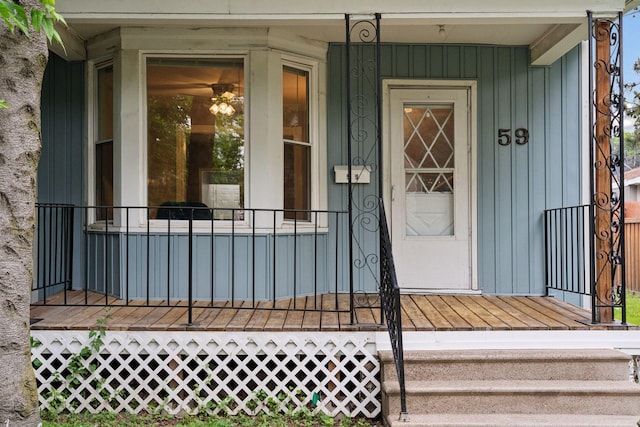 59 Winnipeg Ave, Saint Paul, MN 55117 - property entrance with board and batten siding and a porch