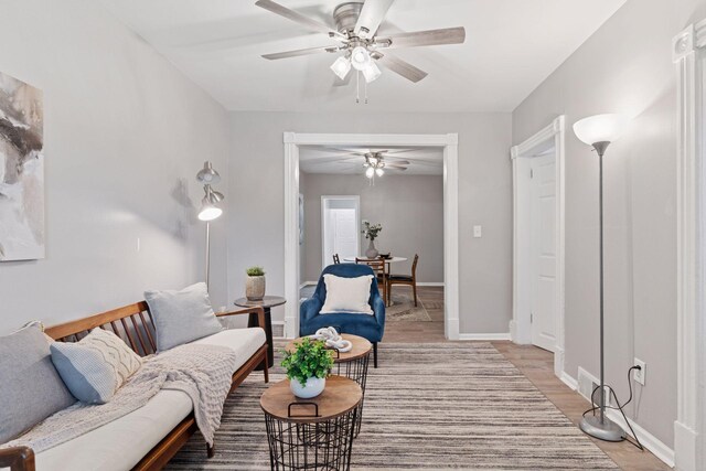 59 Winnipeg Ave, Saint Paul, MN 55117 - living room with a ceiling fan and light wood-style floors