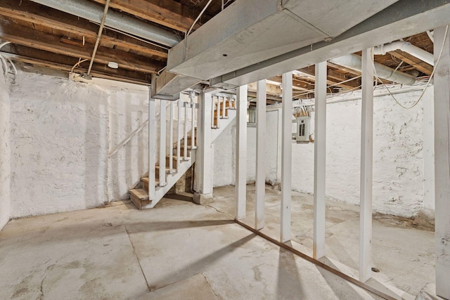 59 Winnipeg Ave, Saint Paul, MN 55117 - unfinished basement featuring stairs and electric panel