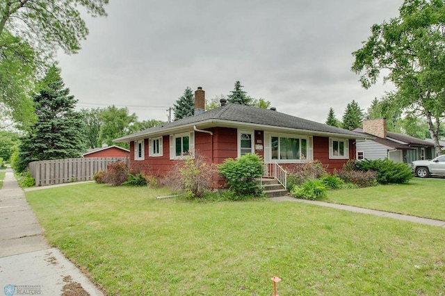1021 1st St S, Moorhead, MN 56560 - ranch-style home with a chimney