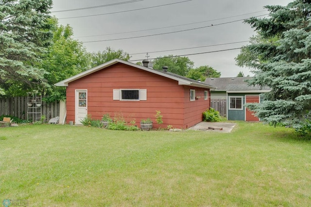 1021 1st St S, Moorhead, MN 56560 - back of property featuring an outbuilding