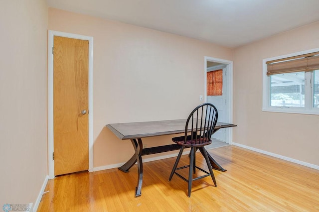 1021 1st St S, Moorhead, MN 56560 - dining room with light wood-type flooring and baseboards
