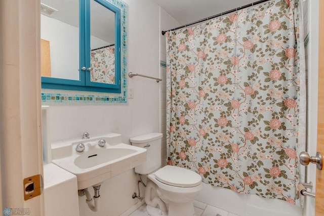 1021 1st St S, Moorhead, MN 56560 - full bath featuring toilet and tile patterned floors