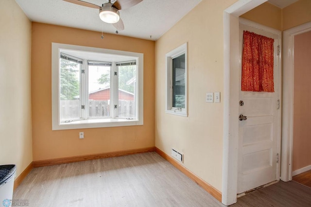 1021 1st St S, Moorhead, MN 56560 - unfurnished room featuring light wood-style flooring and ceiling fan