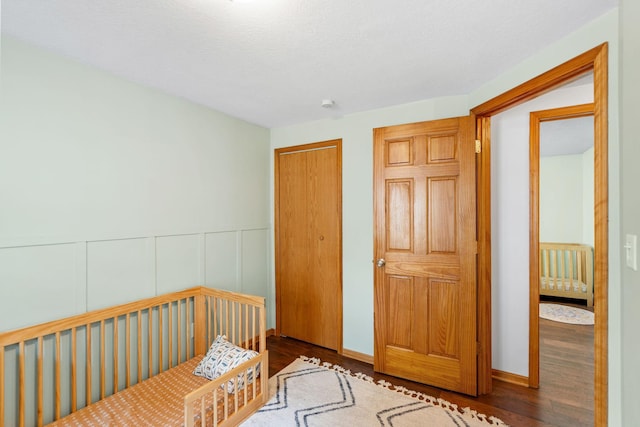 500 Cartway Rd, Champlin, MN 55316 - bedroom featuring wood finished floors and a closet