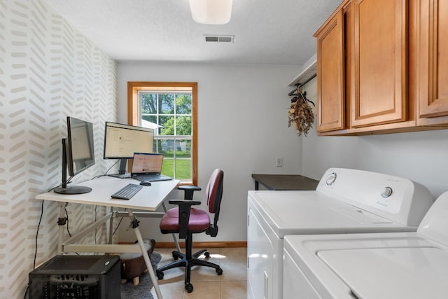 500 Cartway Rd, Champlin, MN 55316 - laundry room with cabinet space, washer and clothes dryer, an office area, a textured ceiling, and light tile patterned floors
