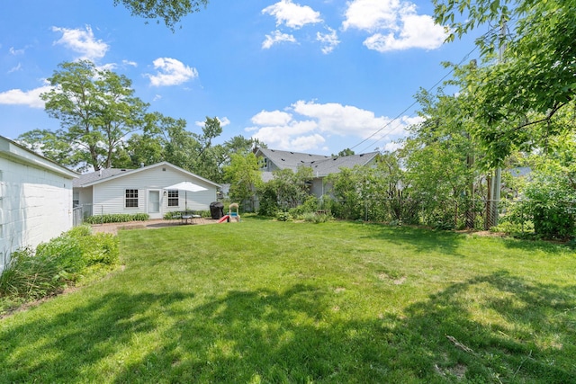 500 Cartway Rd, Champlin, MN 55316 - fenced backyard featuring a patio area