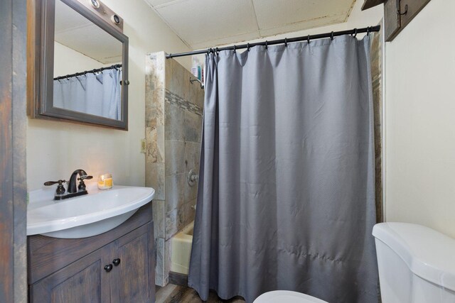 312 5th Ave, Bovey, MN 55709 - full bathroom with vanity and shower / tub combo with curtain