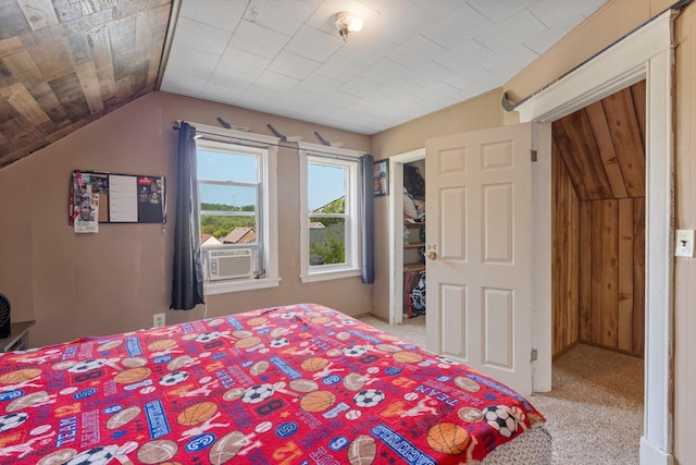 312 5th Ave, Bovey, MN 55709 - carpeted bedroom featuring cooling unit, vaulted ceiling, and a closet