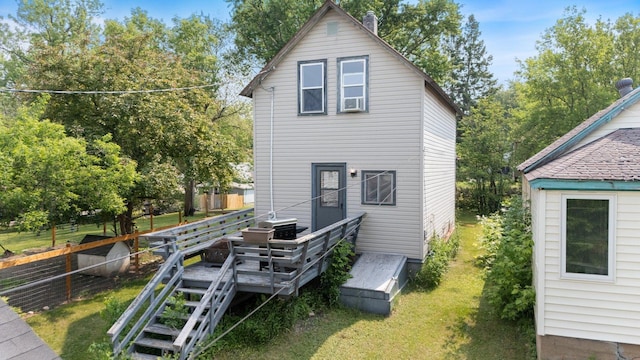312 5th Ave, Bovey, MN 55709 - back of house with a deck