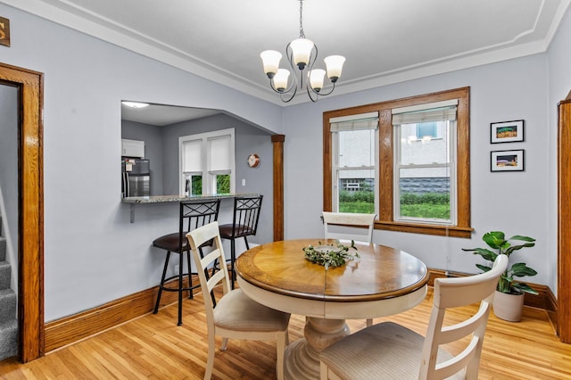 242 Winona St W, West Saint Paul, MN 55118 - dining area with a chandelier and light wood-style floors