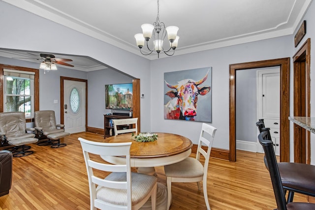 242 Winona St W, West Saint Paul, MN 55118 - dining space featuring a chandelier, light wood-style flooring, a ceiling fan, and crown molding