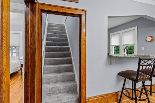242 Winona St W, West Saint Paul, MN 55118 - stairway with wood finished floors and plenty of natural light