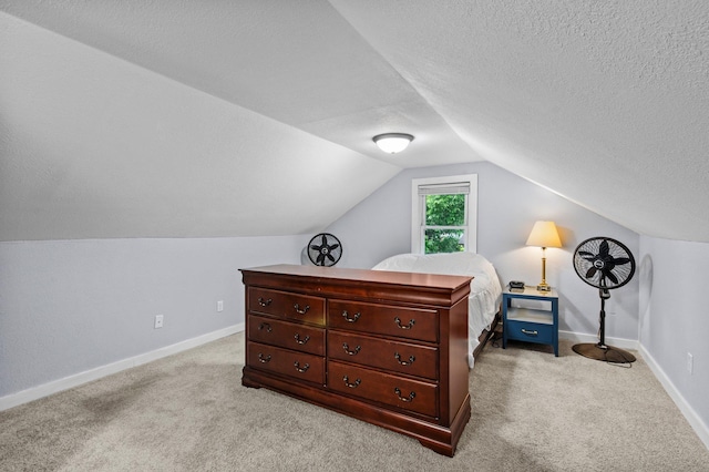 242 Winona St W, West Saint Paul, MN 55118 - carpeted bedroom featuring lofted ceiling and a textured ceiling
