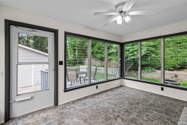242 Winona St W, West Saint Paul, MN 55118 - unfurnished sunroom with a ceiling fan